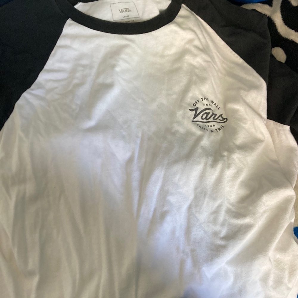 The brand is VANS,color is black and white,size is large
